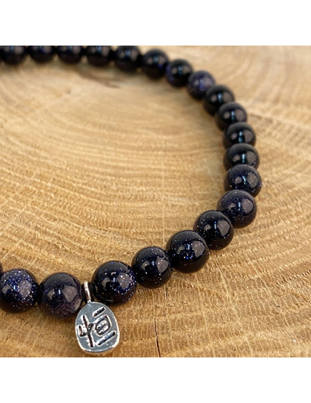 Pulsera de perlas de arena azul