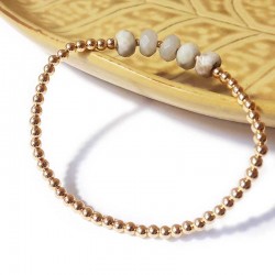 Bracelet à perles dorées et jaspe blanc facetté