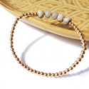 Bracelet à perles dorées et jaspe blanc facetté