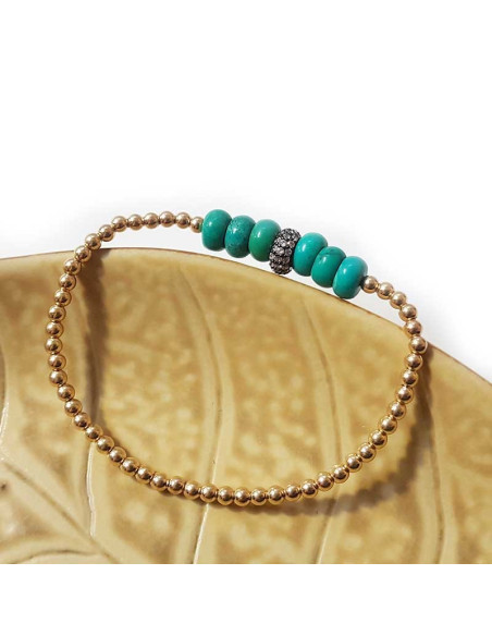 Bracciale con perline tonde dorate e turchesi