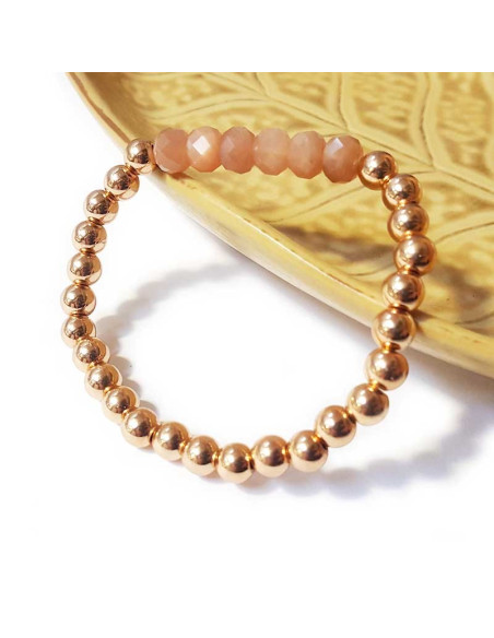 Armband mit dicken goldenen Perlen und facettiertem Sonnenstein
