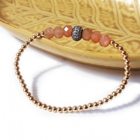Bracelet à perles dorées fines et pierre de soleil facettée