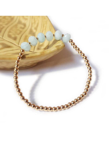 Armband mit goldenen Perlen und facettiertem Aquamarin