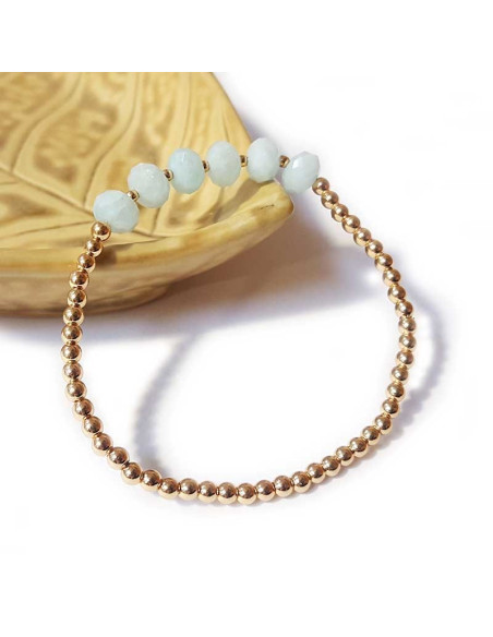 Bracelet à perles dorées et aigue-marine facettée
