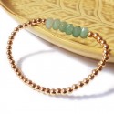 Bracelet with golden beads and faceted aventurine