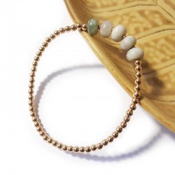 Armband mit goldenen Perlen und weißem Jaspis, rund