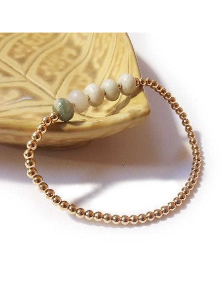 Armband met gouden kralen en witte jaspis rond