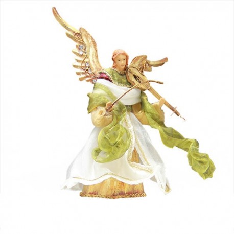 Ángel de metal color dorado y la tela